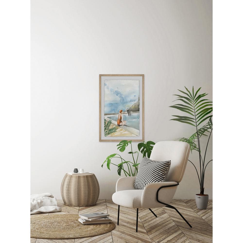 Blue and Beige Framed Canvas Print of Woman by Pool