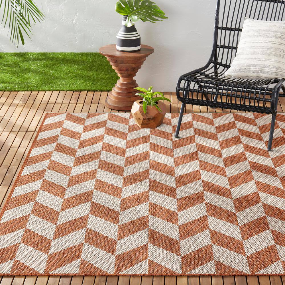 Orange and Ivory Geometric 8' x 10' Synthetic Area Rug