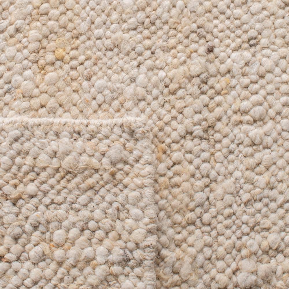 Ivory Handwoven Wool Rectangular 8' x 10' Area Rug