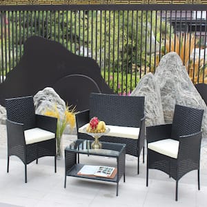 4-Piece Wicker Outdoor Bistro Set with Beige Cushion and Rectangular Glass Coffee Table