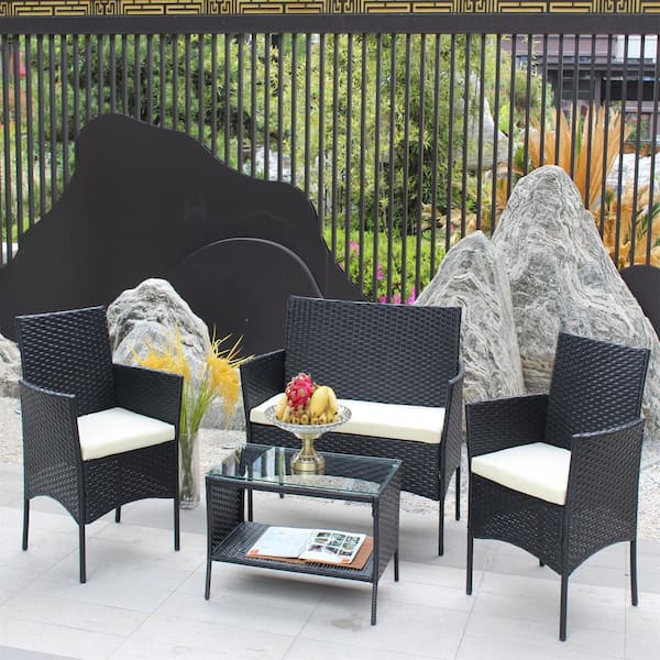 Otryad 4-Piece Wicker Outdoor Bistro Set with Beige Cushion and Rectangular Glass Coffee Table