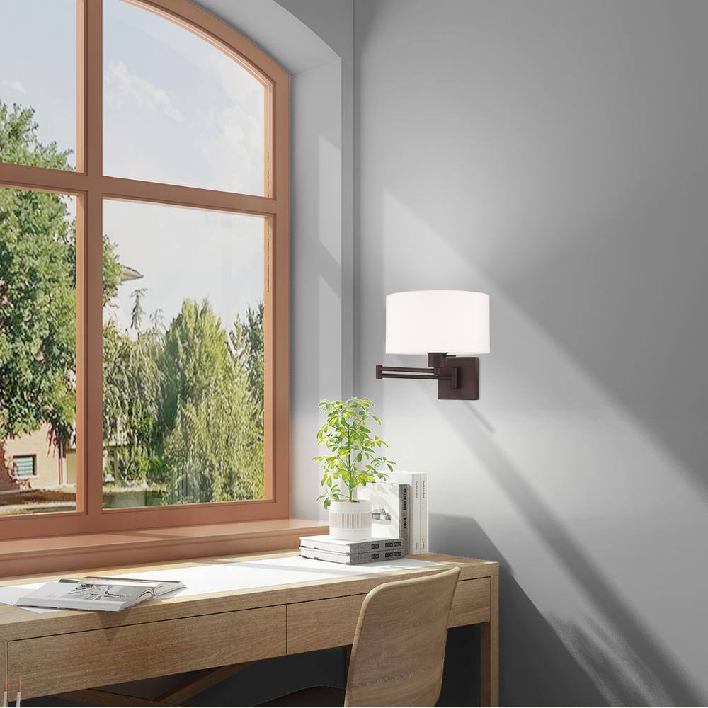 Transitional Bronze Swing Arm Wall Lamp with Off-White Fabric Shade