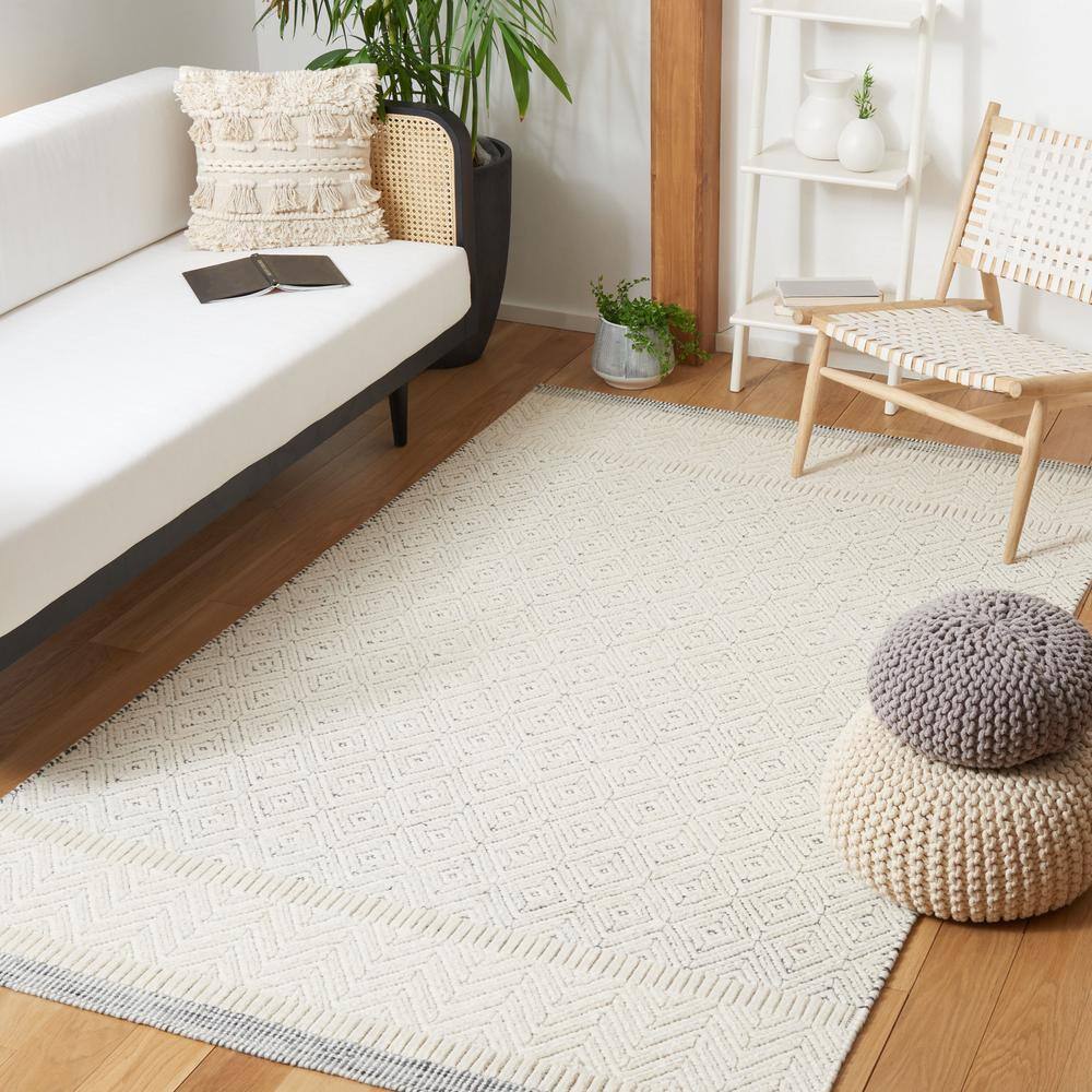 Ivory Tufted Rectangular Wool Area Rug, 5 ft. x 8 ft.
