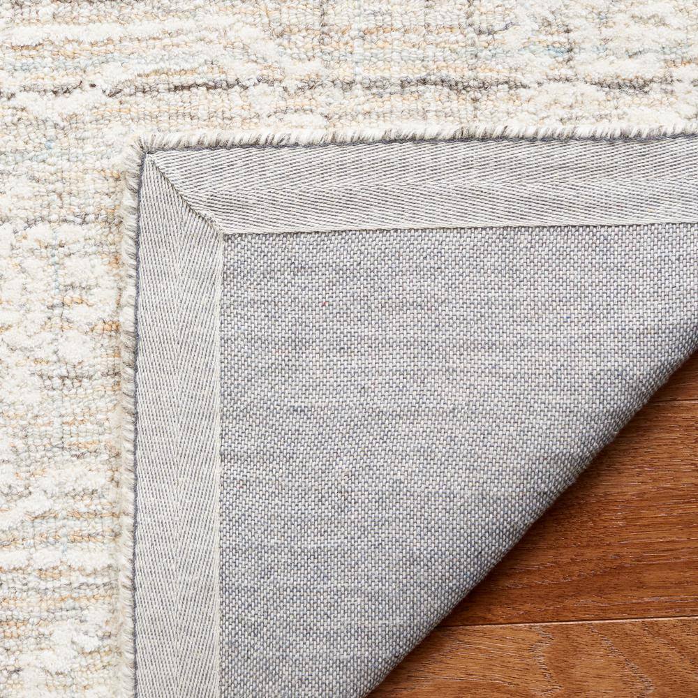 Ivory Tufted Wool 4' x 6' Rectangular Area Rug