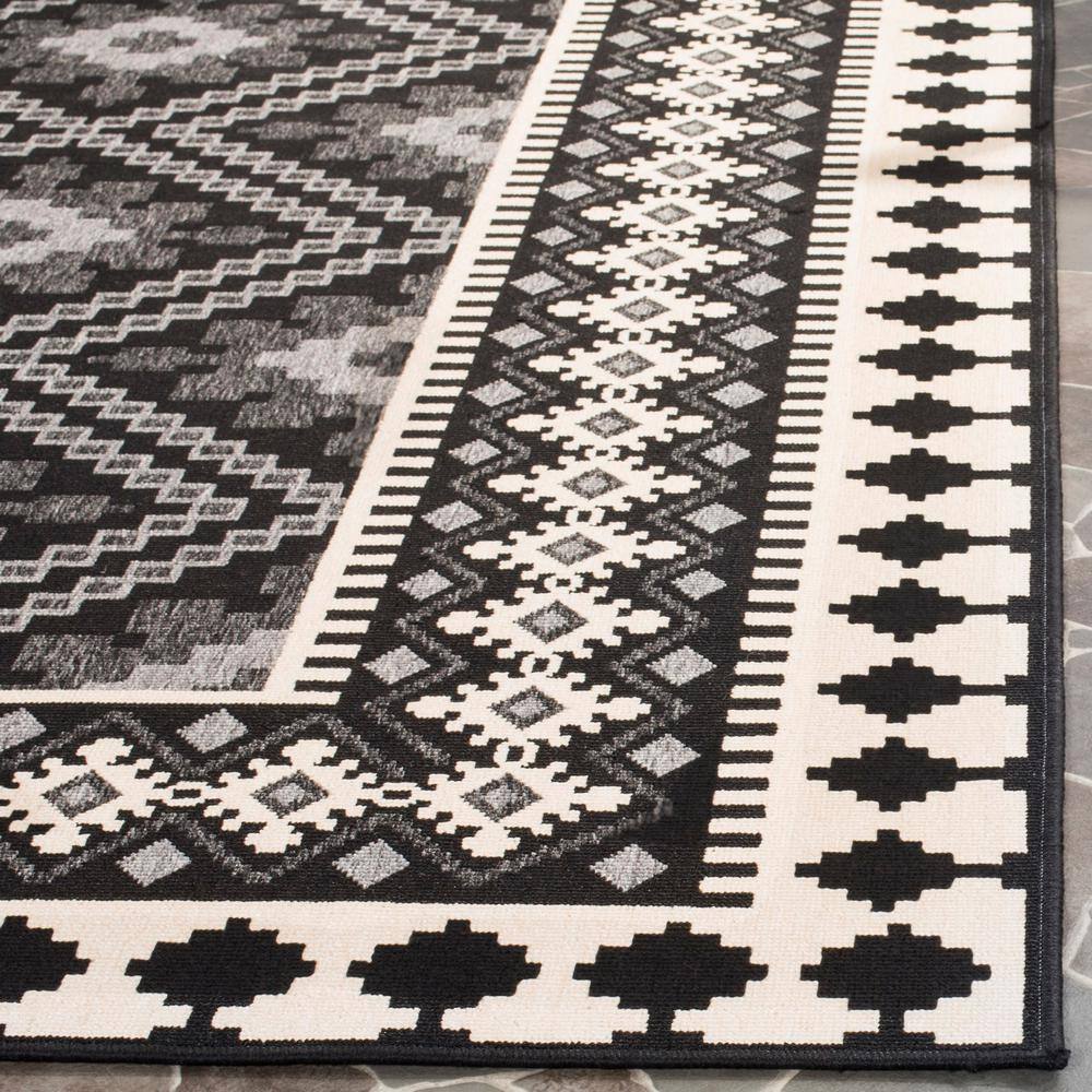 Reversible Easy-Care Black and Cream Synthetic Runner Rug, 2'3" x 12'