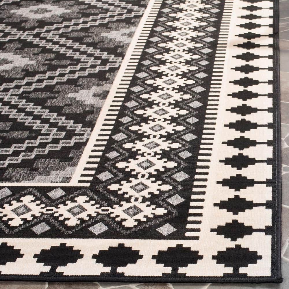 Veranda Black and Cream Synthetic 9' x 12' Easy-Care Outdoor Rug