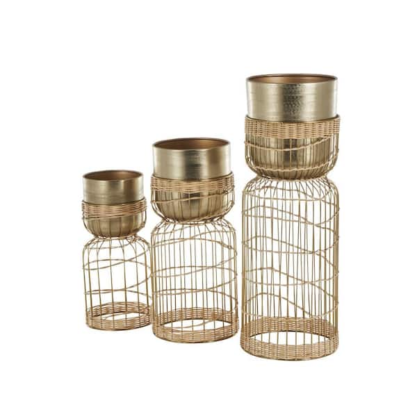 Litton Lane Gold Metal Textured Dome Planter with Woven Rattan and Caged Rod Pedestal Base, 30 in. 23 in. 18 in. H (Set of 3)