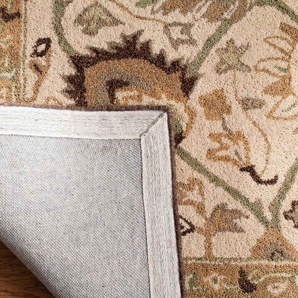 Ivory and Brown 8' x 10' Handmade Wool Floral Rug