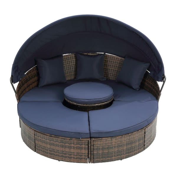 Brown Wicker Outdoor Day Bed with Navy Blue Cushions, Canopy and Lift Coffee Table