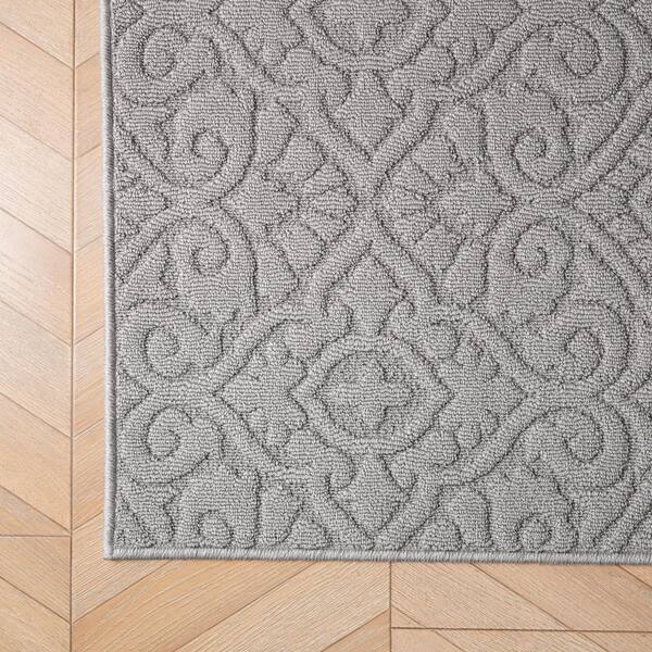 Feya Solid Light Gray 2 ft. x 8 ft. Tufted Medallion Polypropylene Runner Rug
