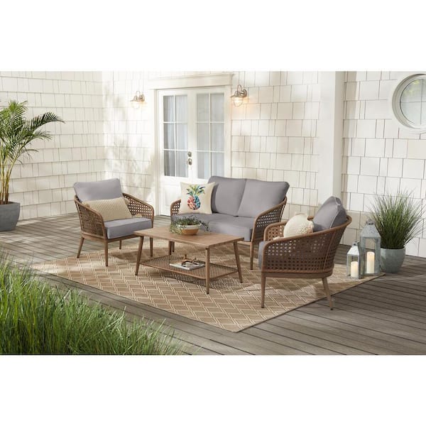 Hampton Bay Coral Vista 4-Piece Brown Wicker and Steel Patio Conversation Seating Set with CushionGuard Stone Gray Cushions