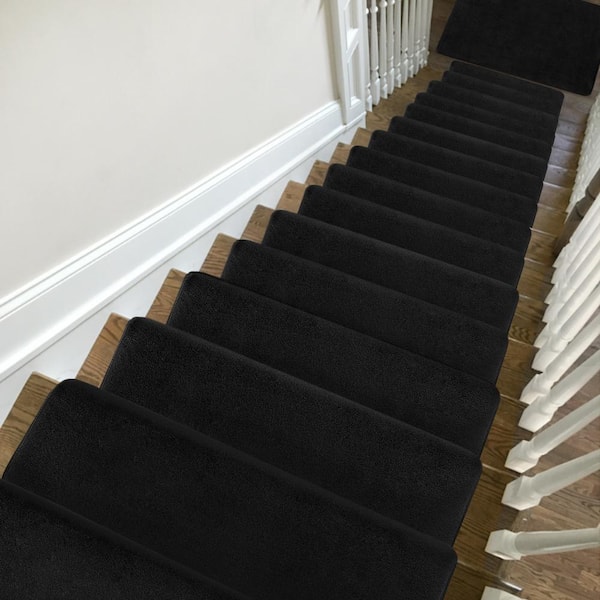 https://images.thdstatic.com/productImages/006a278c-44f0-4bc4-8f5f-e6fa5234a641/svn/black-pure-era-stair-tread-covers-pe-st08-blk14-4f_600.jpg