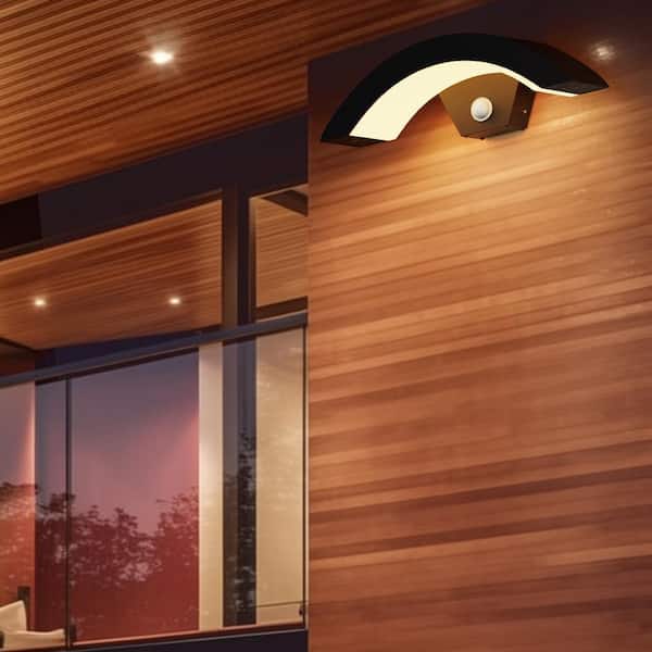 3.94 in. Black Arc Modern Lantern Wall Sconce Indoor/Outdoor with Motion Sensing and Dusk-to-Dawn 18W Integrated LED