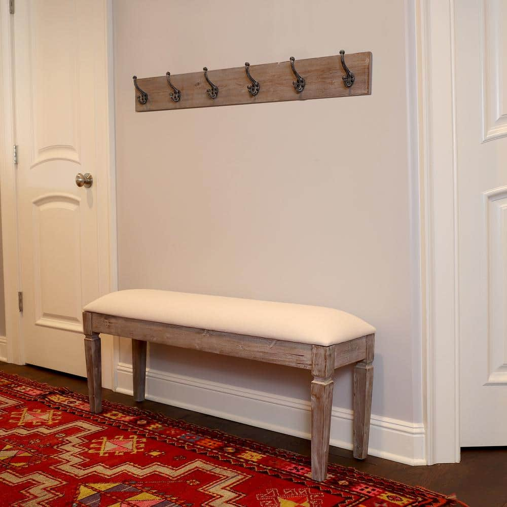 white coat rack with bench