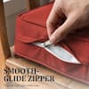 Close-up of a smooth-glide zipper on a cushion cover.