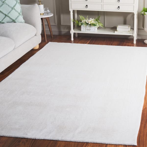 Faux Fur Ivory 5 ft. x 8 ft. Machine Washable Solid Area Rug