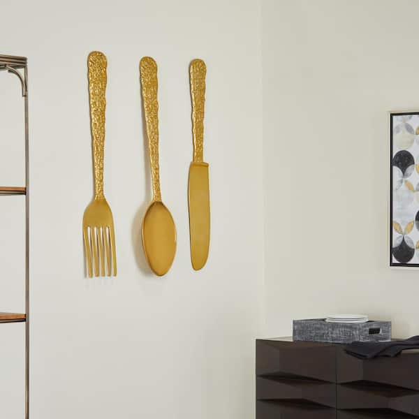 Litton Lane Aluminum Gold Knife, Spoon and Fork Utensils Wall Decor (Set of 3)