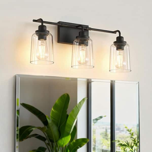 23.3 in. 3-Light Black Metal Vanity Wall Light with Curved Clear Glass Cylinder Shades, Traditional Bathroom Fixture