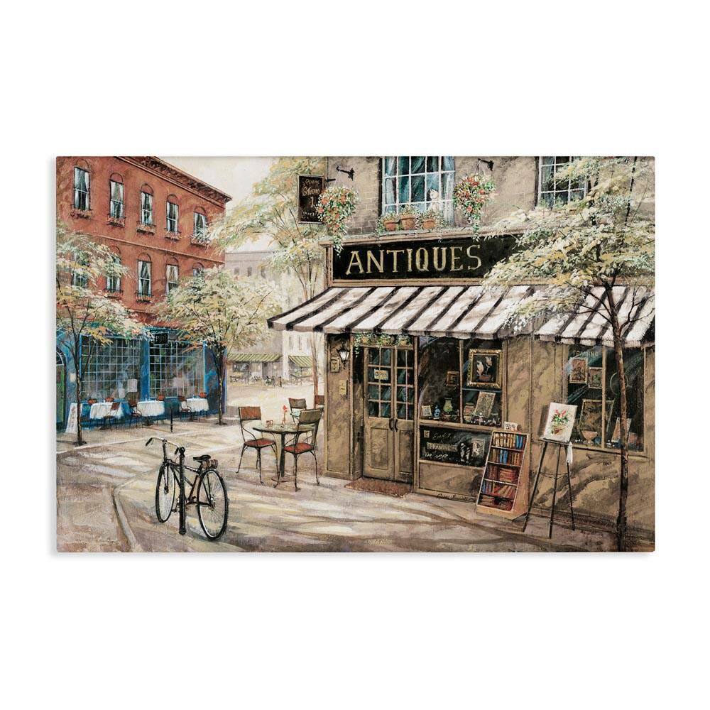 Cozy Town Antiques Shop by Ruane Manning Unframed Architecture Graphic Art Print 24 in. x 36 in. price history on PriceWatchPro