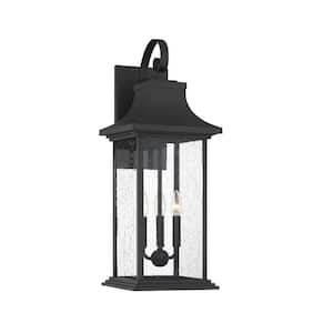 Hancock 10.5 in. W x 27.75 in. H 3-Light Matte Black Hardwired Outdoor Wall Lantern Sconce with Clear Seeded Glass Shade