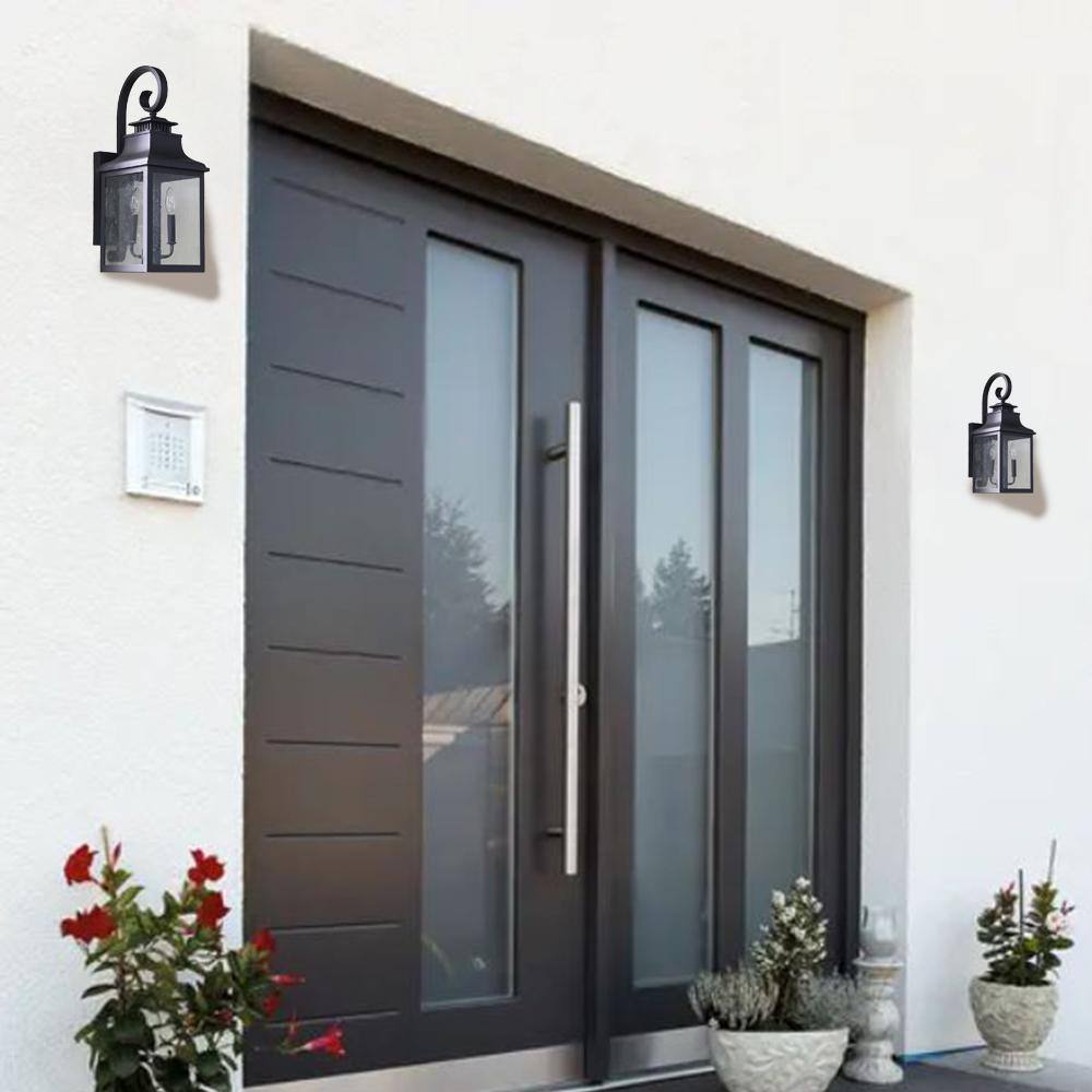 Black Metal Lantern Sconce with Seeded Glass Shade