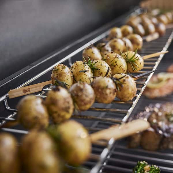 Genesis S-415 4-Burner Liquid Propane Gas Grill in Stainless Steel with Full Size Griddle Insert
