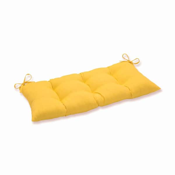 Pillow Perfect Solid Rectangular Outdoor Bench Cushion in Yellow