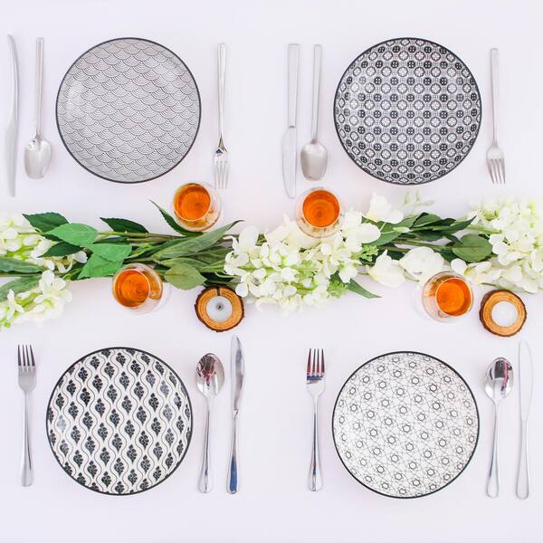 https://images.thdstatic.com/productImages/010c7f31-771d-4d47-b031-934620c6ae8f/svn/black-and-white-patterned-vancasso-salad-plates-dessert-plates-vc-haruka-sxp-1f_600.jpg