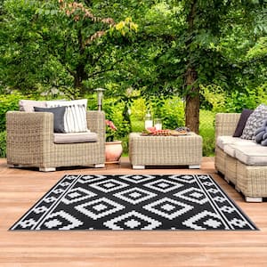 Milan Black and White 4 ft. x 6 ft. Reversable Indoor/Outdoor Recycled, Plastic, Weather,Water,Stain,Fade & UV Resistant