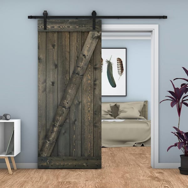 https://images.thdstatic.com/productImages/012daeb0-fcbf-4d8d-862b-80efe53d029f/svn/ebony-dessliy-barn-doors-hds01ebny28fsu-c3_600.jpg