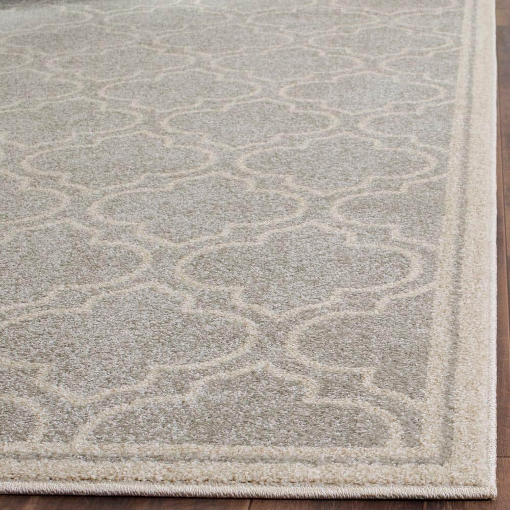Ivory and Light Grey Geometric Synthetic 6' x 9' Area Rug