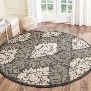 Courtyard Black/Sand 7 ft. x 7 ft. Round Floral Indoor/Outdoor Patio  Area Rug