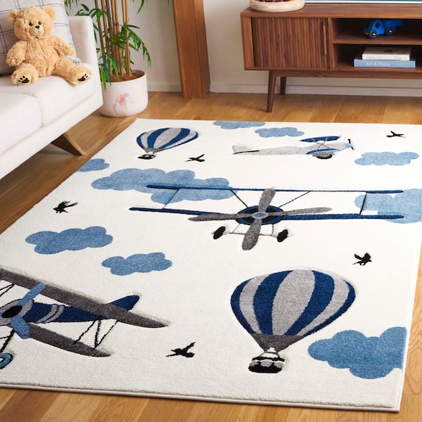 Carousel Kids 7 ft. x 9 ft. Ivory/Blue Helicopter Area Rug