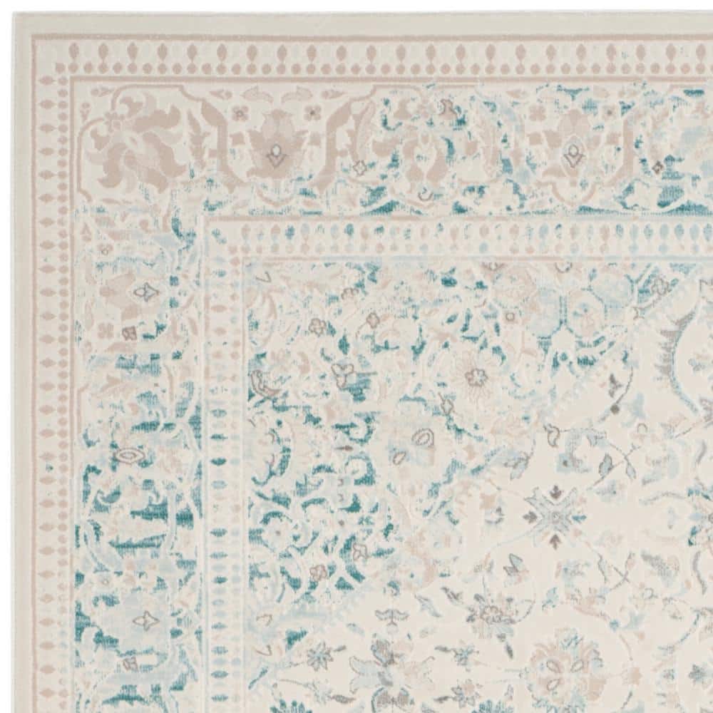 Ivory and Turquoise 9' x 12' Vintage Distressed Area Rug