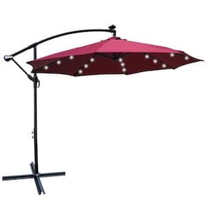 10 ft. Metal Outdoor Patio Umbrella Solar Powered LED Lights with Crank and Cross Base in Wine Red