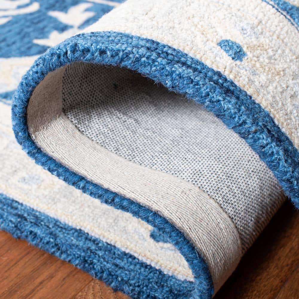 Navy and Ivory Tufted Handmade Wool 8' x 10' Area Rug