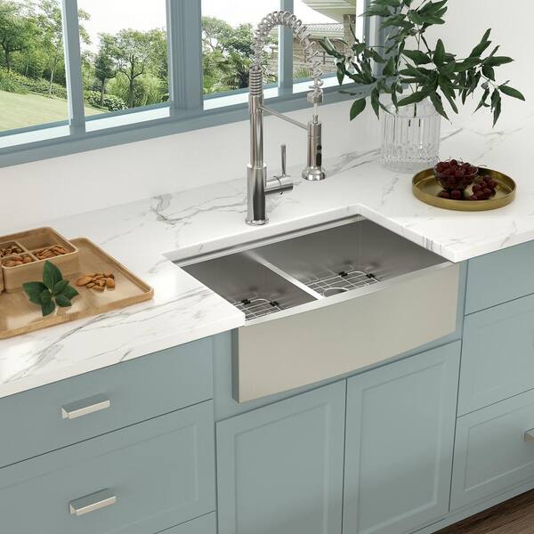 https://images.thdstatic.com/productImages/017430d1-c816-478c-b306-376239c191e6/svn/silver-farmhouse-kitchen-sinks-asstqb332255-4f_600.jpg