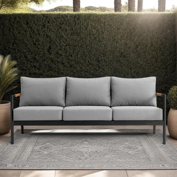 Armen Living Crown Black Aluminum and Teak Wood Outdoor Couch with Dark Gray Cushions