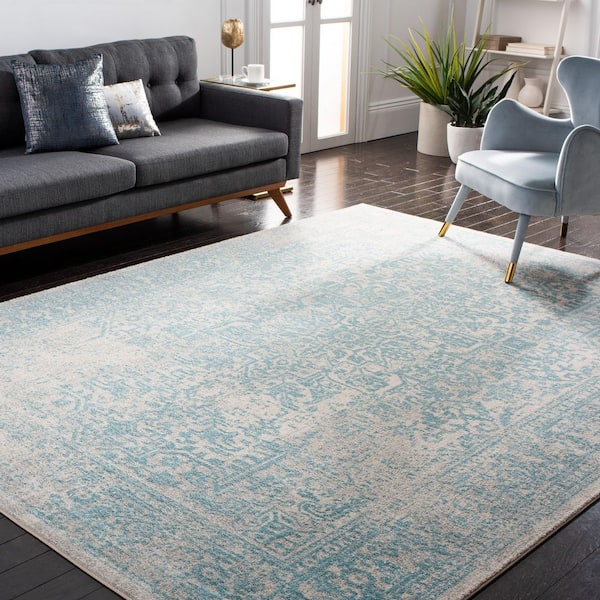 Evoke Ivory/Aqua 8 ft. x 10 ft. Distressed Border Medallion Area Rug