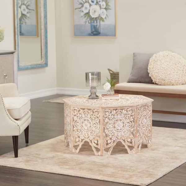 Litton Lane 33 in. White Medium Round Wood Handmade Intricately Carved Floral Coffee Table