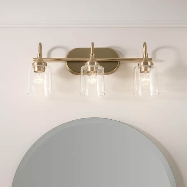 Erta 24 in. 3-Light Champagne Bronze Bathroom Vanity Light with Clear Glass Shades