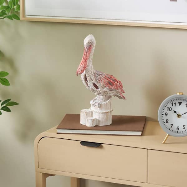 Litton Lane Red 8 in. x 13 in. Polystone Textured Pelican Sculpture with Red Feathers and Round Blocks