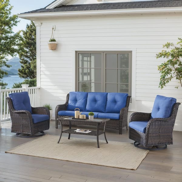 4-Piece Brown Wicker Patio Conversation Set with Olefin Blue Cushions and Swivel Glider Chairs/Sofa