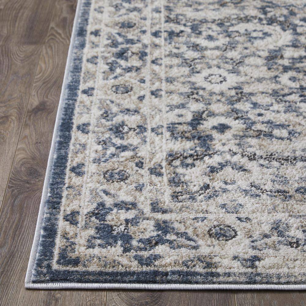 Rectangular 9' x 12' Blue Floral Synthetic Area Rug