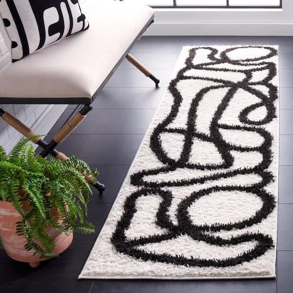 Norway 2 ft. x 10 ft. Ivory/Black Abstract Linear Runner Rug