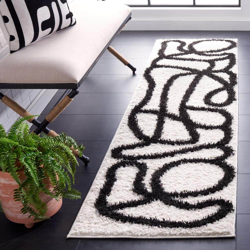 Norway 2 ft. x 12 ft. Ivory/Black Abstract Linear Runner Rug price history on PriceWatchPro