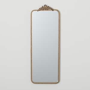 12 in. W x 33.5 in. H Elongated Gold-Trimmed Wall Mirror