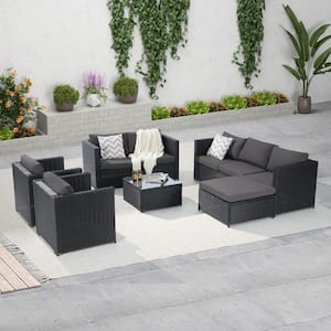 Black 6-Piece Wicker Outdoor Sectional Set with Dark Gray Cushions and Dining Table