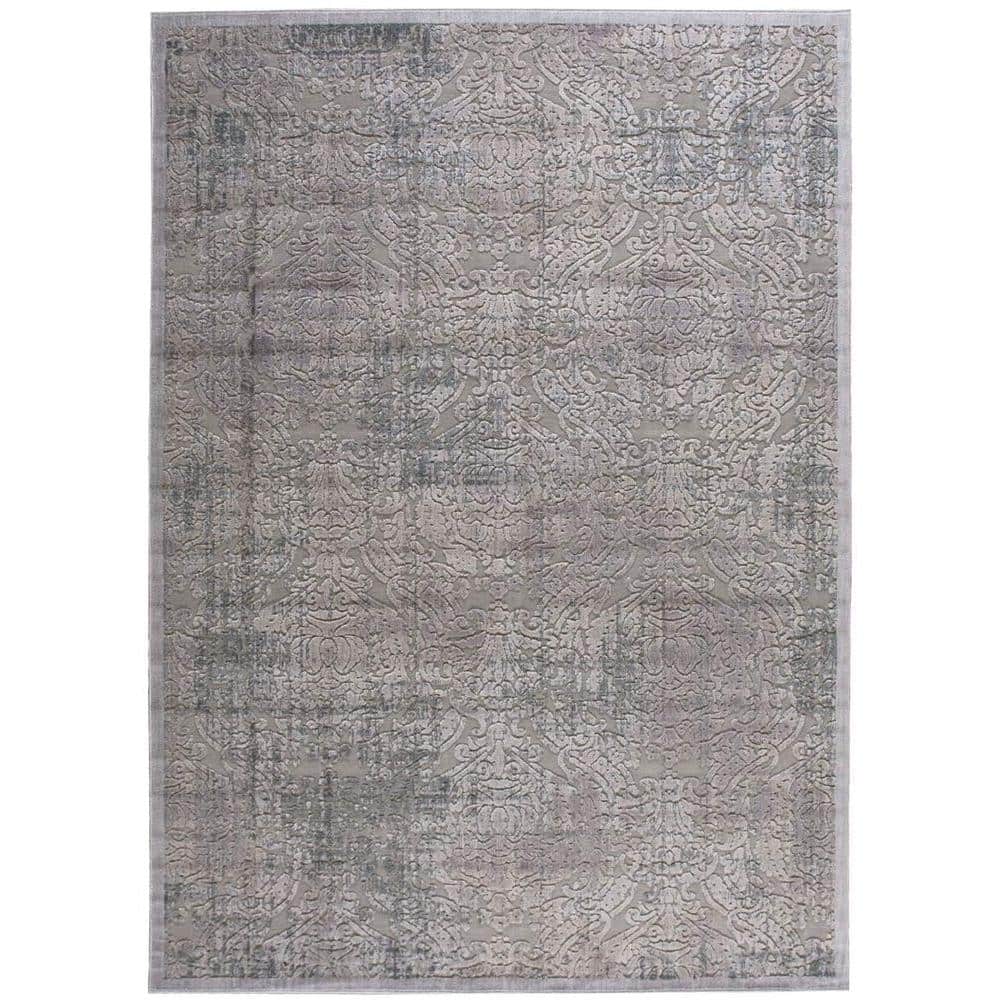 Nourison Graphic Illusions Grey 8 ft. x 11 ft. Persian Vintage Area Rug Extremely comfortable, the Nourison Graphic Illusions 8 ft. x 11 ft. Area Rug is the ideal finishing touch to your home. With a modern style, this rug is great for contemporary layouts. It is designed with elements of gray, offering a calm and refined finish to any room. This rug is designed with a geometric print, displaying crisp, clean lines. It has a 70% acrylic design, making it a durable option with remarkable longevity. Color: Grey.