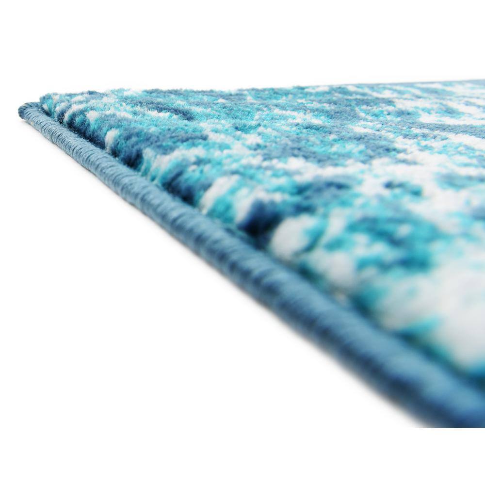 Turquoise and Ivory Geometric Synthetic Area Rug